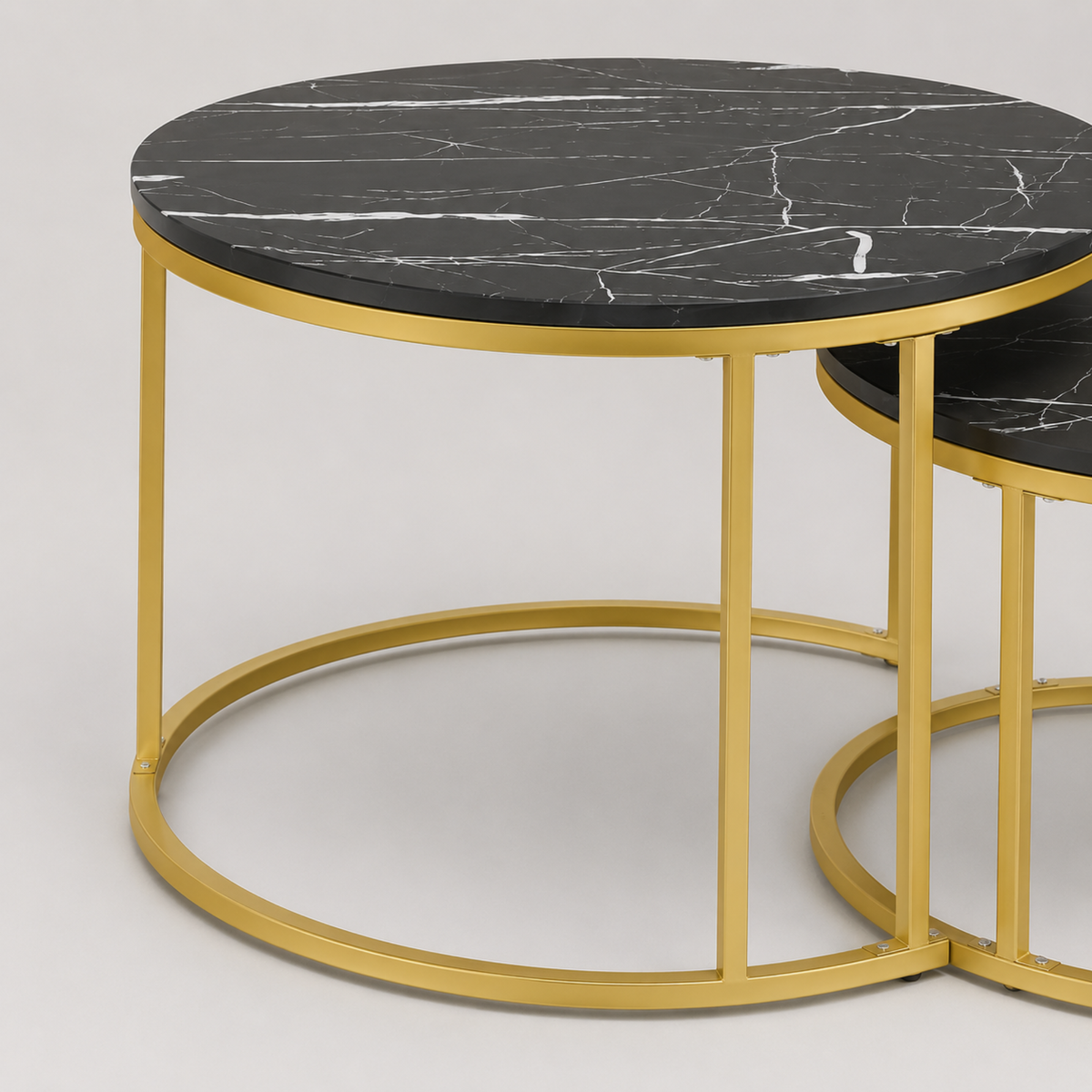 Ilona | Duo de tables basses gigognes rondes en marbre noir et métal doré